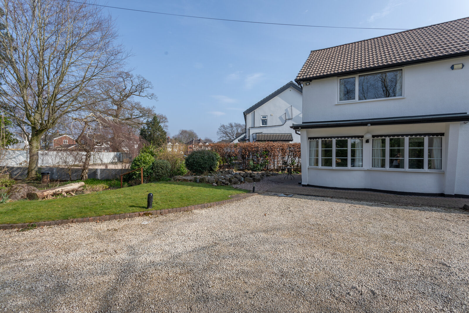 Robins Perch Bramhall — house exterior and driveway